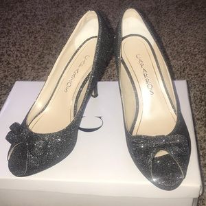 Caparros black sparkly open toe heels.